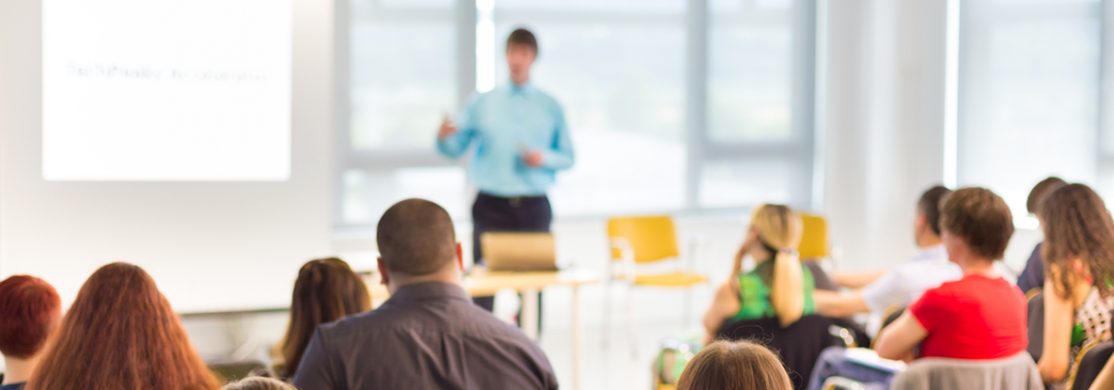 people listening to a presentation