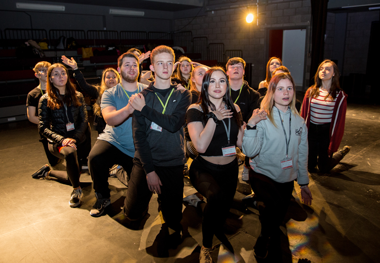 group of students on stage