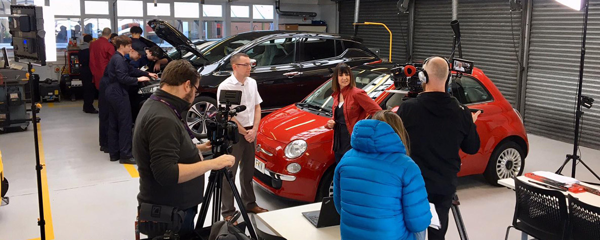 BBC X-Ray's Lucy Owen filming at Coleg Gwent's Automotive department