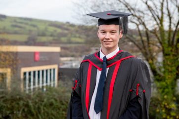 Kieron Cole in graduation gown