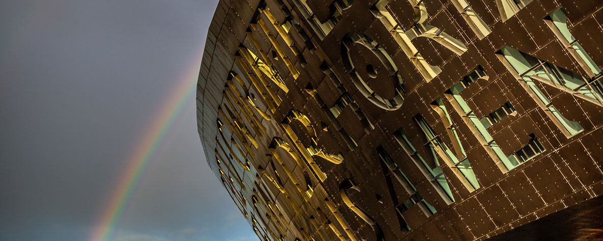 Millennium Centre building and rainbow