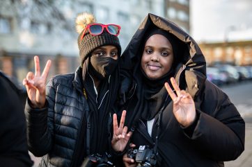 Photography learners holding cameras