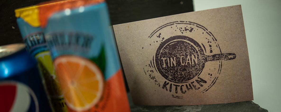 Tin Can Kitchen business card with cans