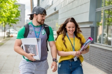 FE Myth Buster - students walking outside Coleg Gwent campus