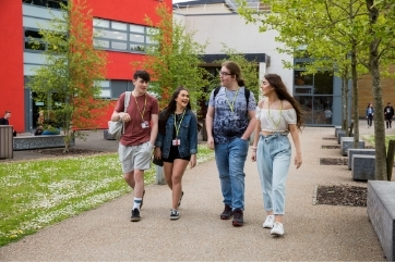 Starting college - ŮŸ learners walking outside Crosskeys campus