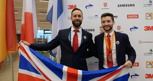 10-experts Tutors wearing medals