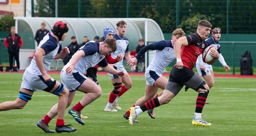 Rugby player running with ball