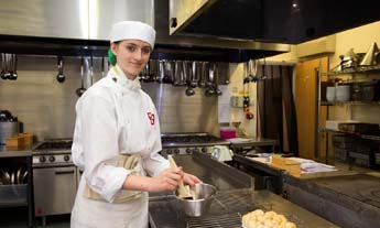 Catering student in the kitchen