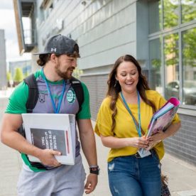 HE students walking through campus