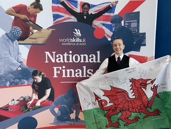 Worldskills student with Welsh flag
