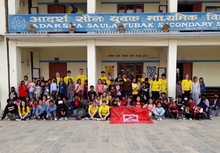 ϲ students abroad at a school