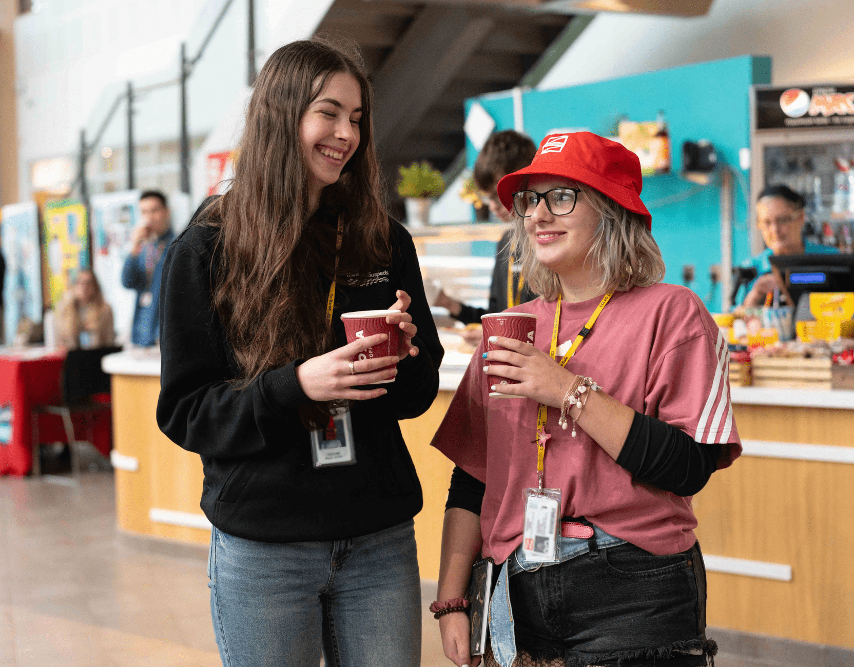 Two students drinking coffee