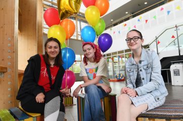 Students celebrating with balloons