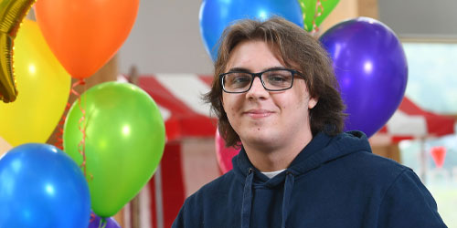 Max with balloons