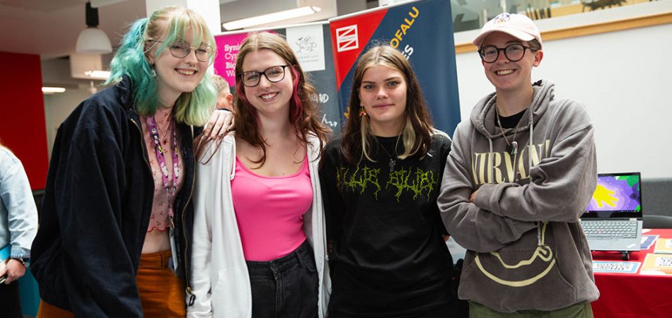 Four students at Freshers Fayre