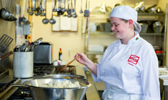 Catering student in the kitchen