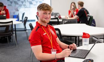 Public Services student on laptop