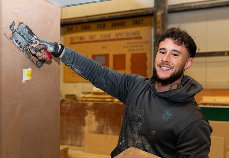 Plastering student