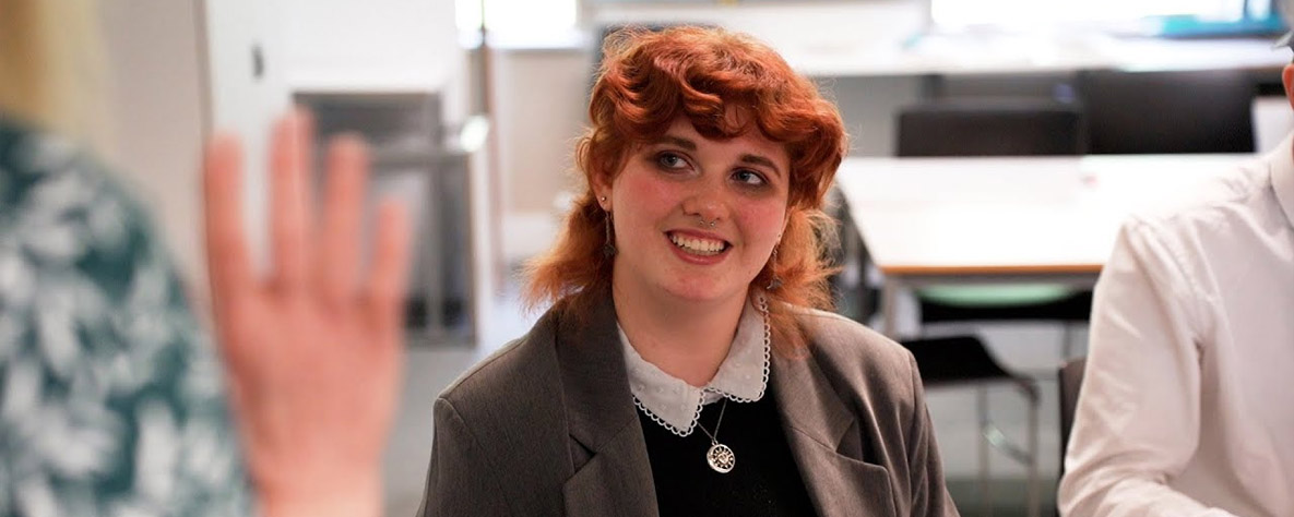 Student smiling in class