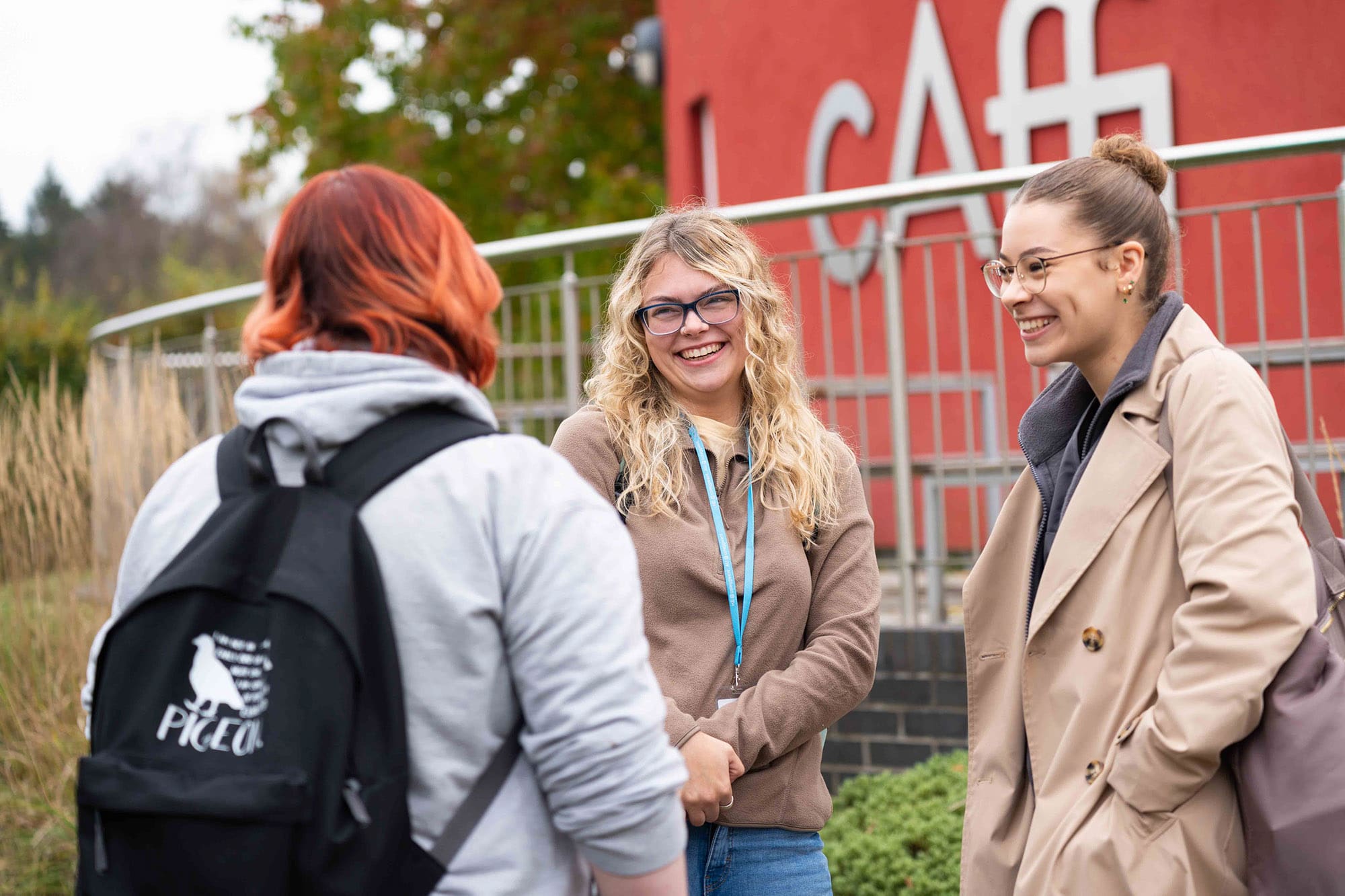 3 students talking