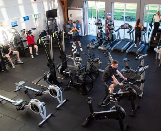 People using exercise equipment at Usk gym