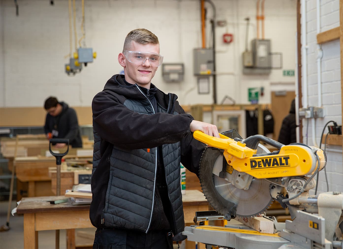 Carpentry student using a circular saw