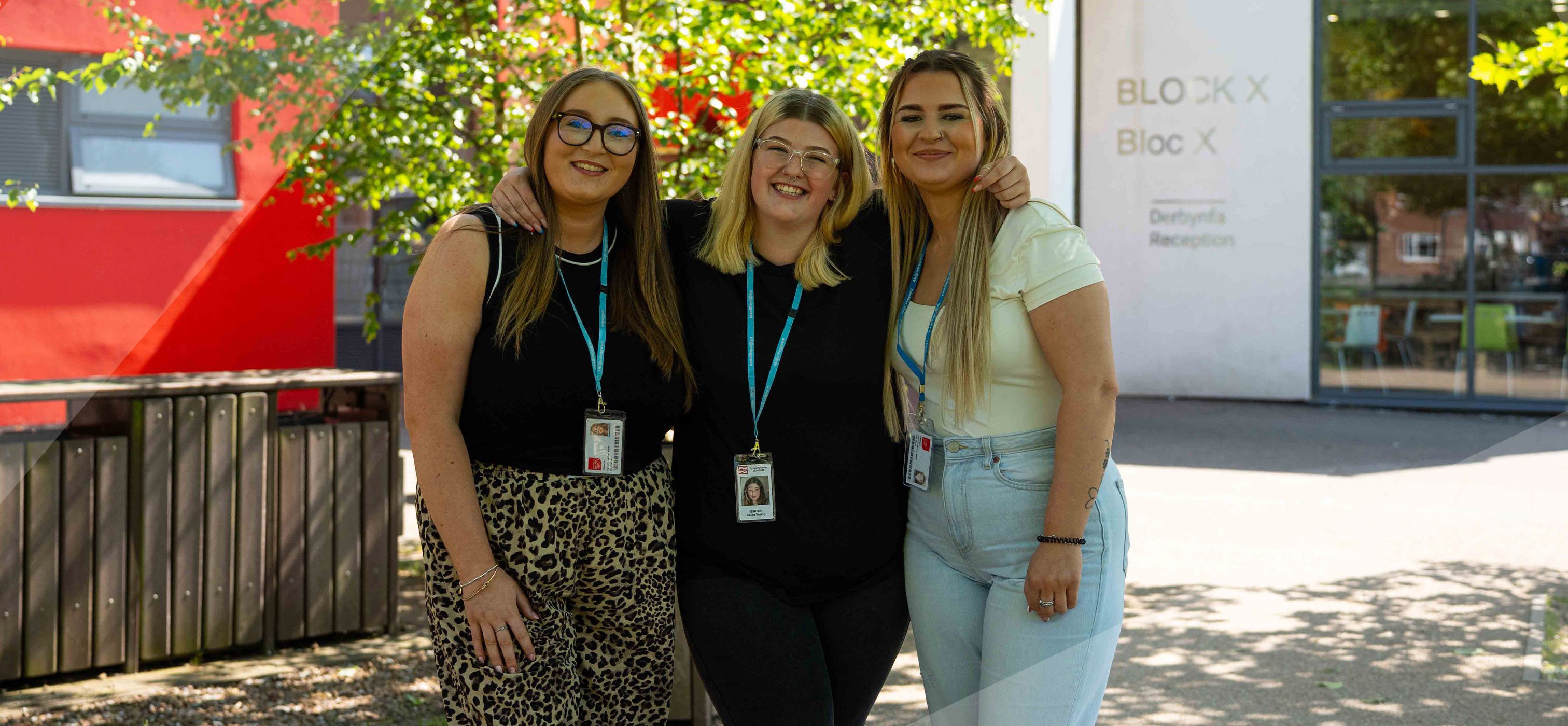 Students smiling outside Crosskeys Campus