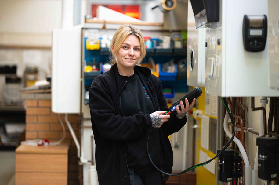 Plumbing student smiling