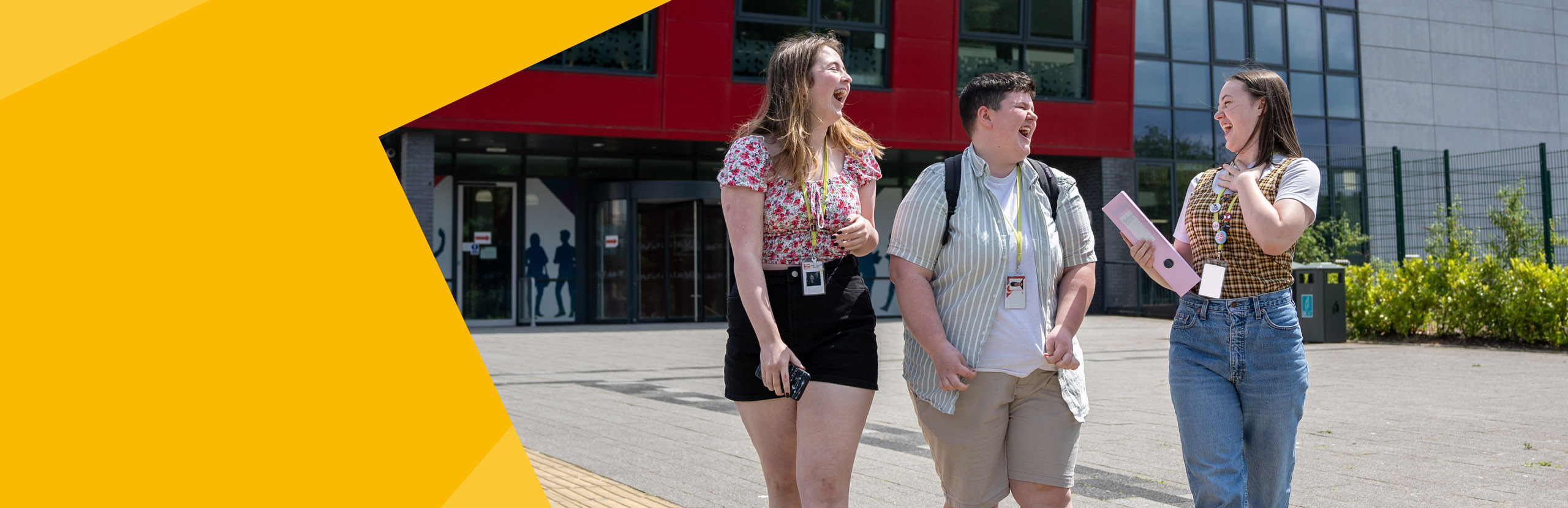 Students laughing outside Torfaen Learning Zone