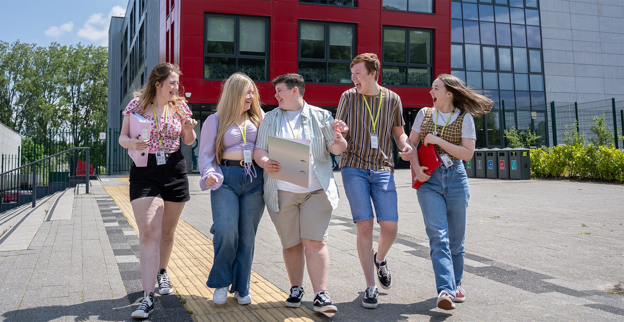Students laughing outside TLZ