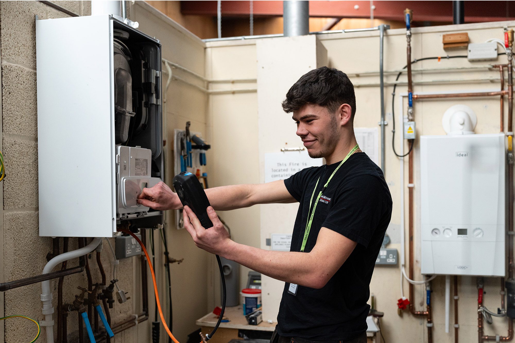 Student testing a domestic boiler