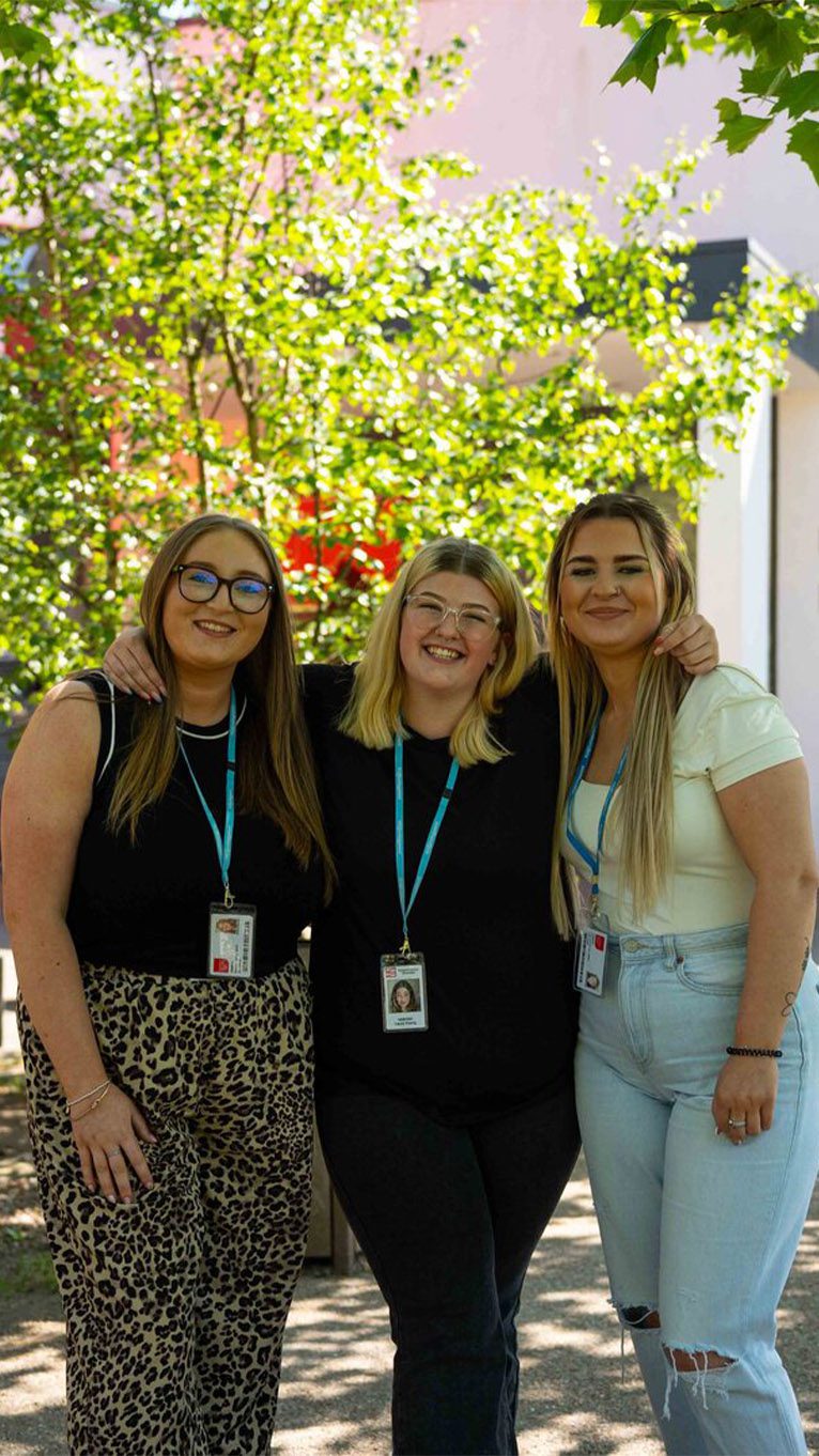 Students smiling outside Crosskeys Campus