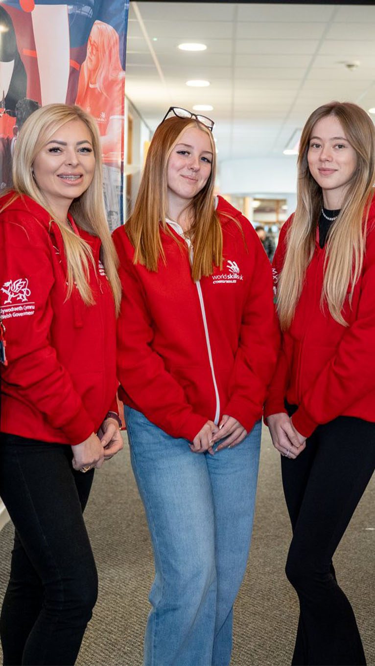 Three Worldskills UK students smiling